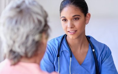 Doctor talking to patient about infusion therapy